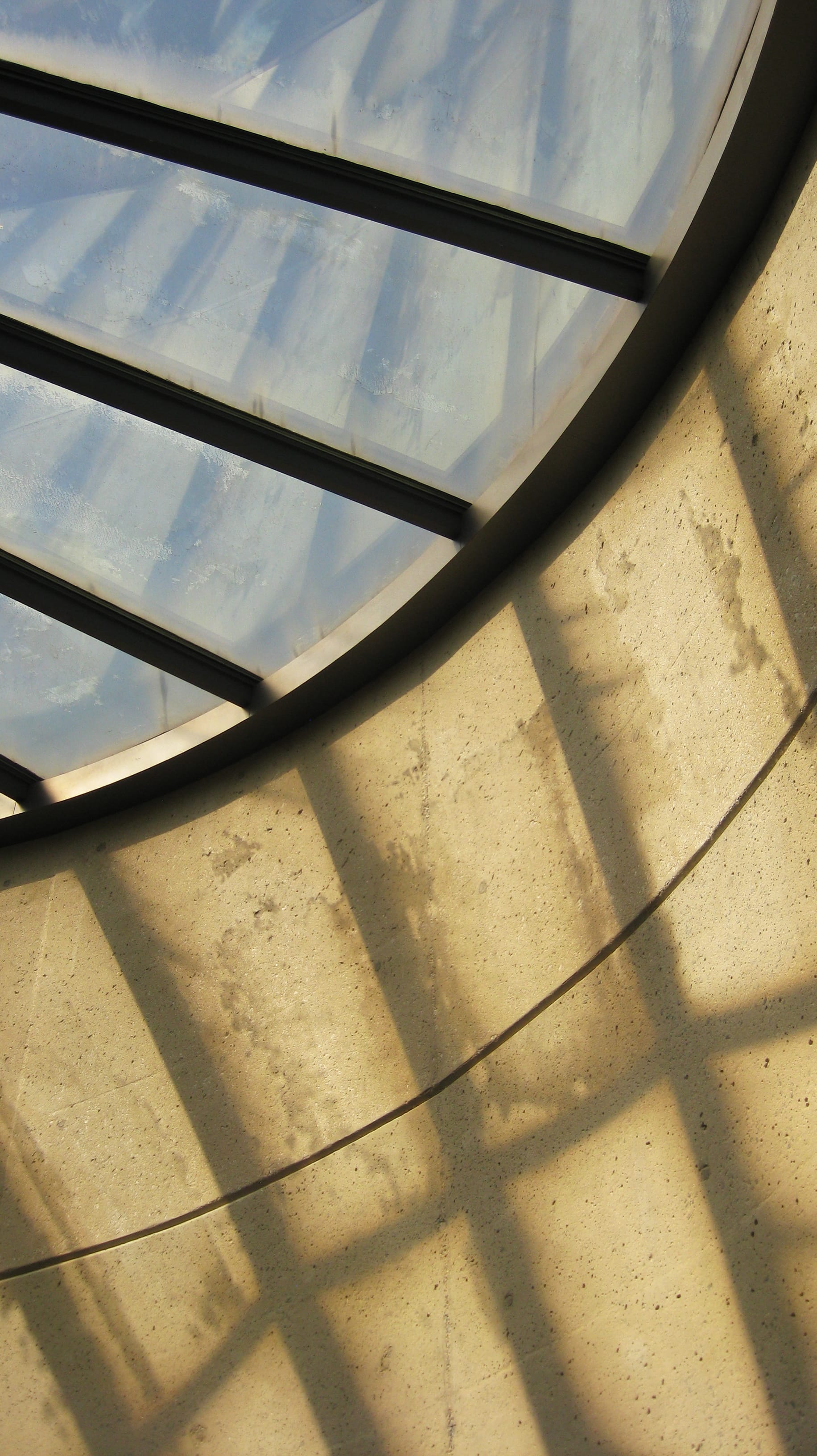 A photograph of the afternoon light casting shadows through the ceiling windows at the American Visionary Arts Museum.
